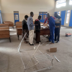 CEM Gitaba Teachers Assemble the SK 14 Solar Cooker