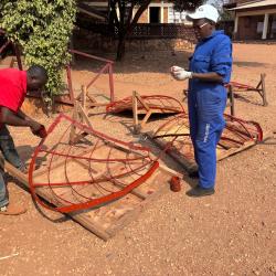 V2SDF teacher training incorporates the vital finishing stage of painting the parabolic structure for durability and performance.