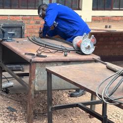 V2SDF training expands expertise as educators master profile bending for a new parabolic cooker model.