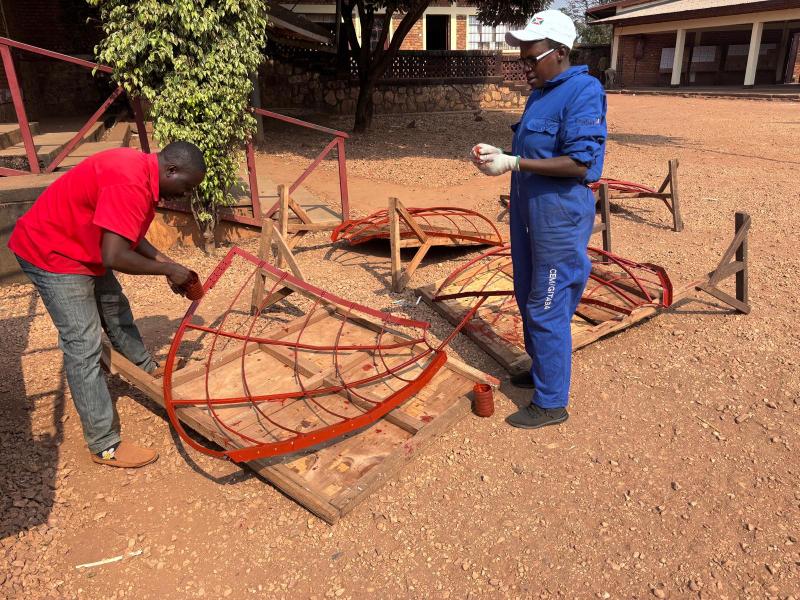 V2SDF teacher training incorporates the vital finishing stage of painting the parabolic structure for durability and performance.