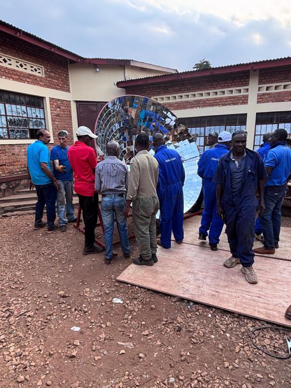 V2SDF training culminates as educators complete the final assembly of the industrial SK-23 parabolic solar cooker.