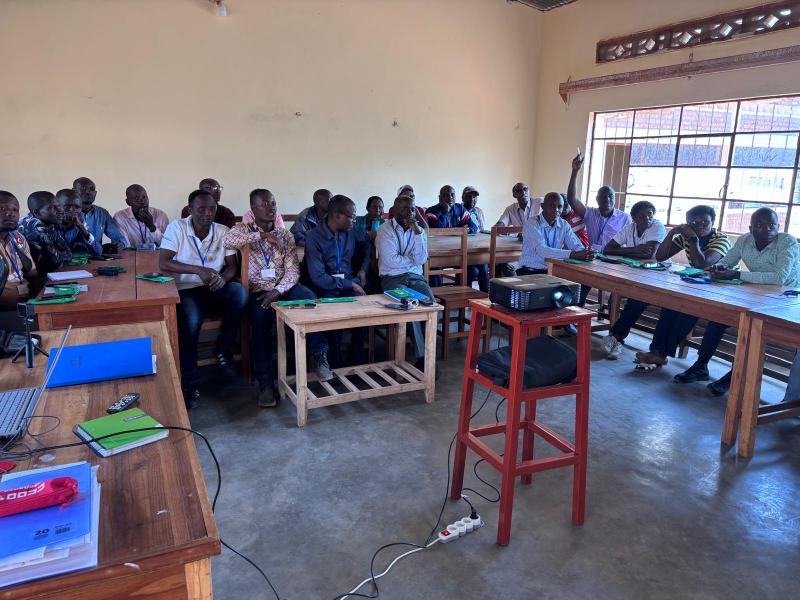 Educators collaborate to create formal training manuals and student guides for solar cooker fabrication courses.